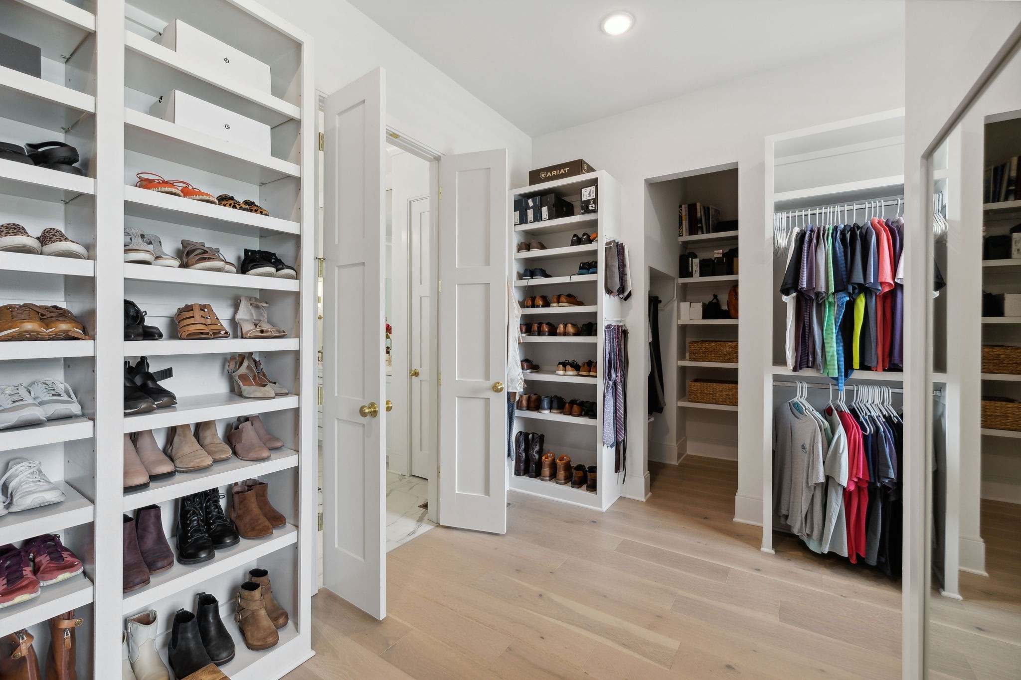 6324 Percheron Lane Arrington, TN 37014 - Photo 27 of 53 a view of walk in closet with clothes and shoes