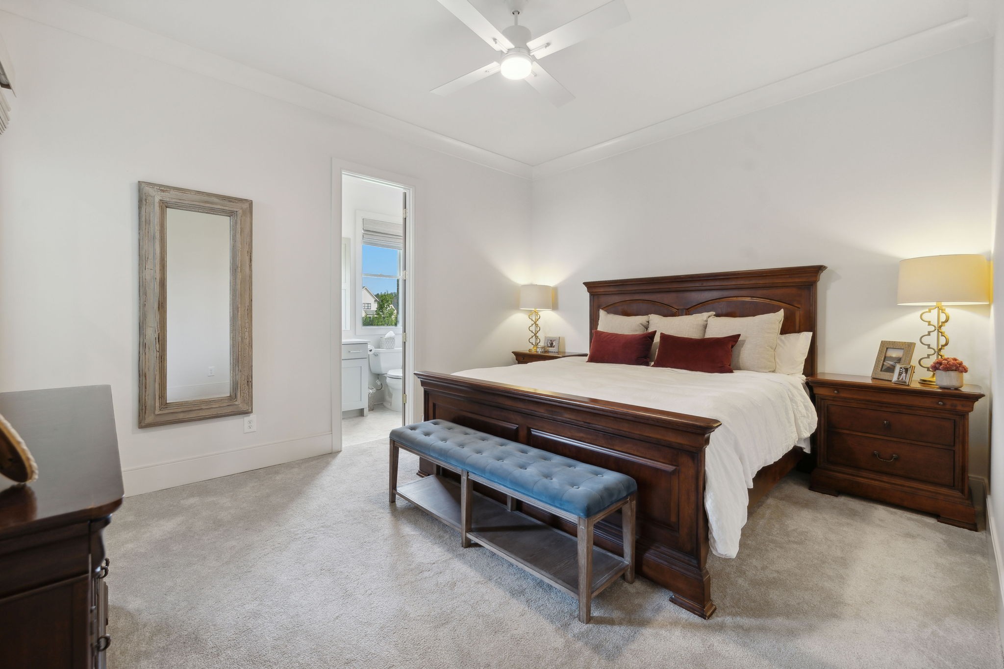 6324 Percheron Lane Arrington, TN 37014 - Photo 28 of 53 a bed sitting in a bedroom next to a window