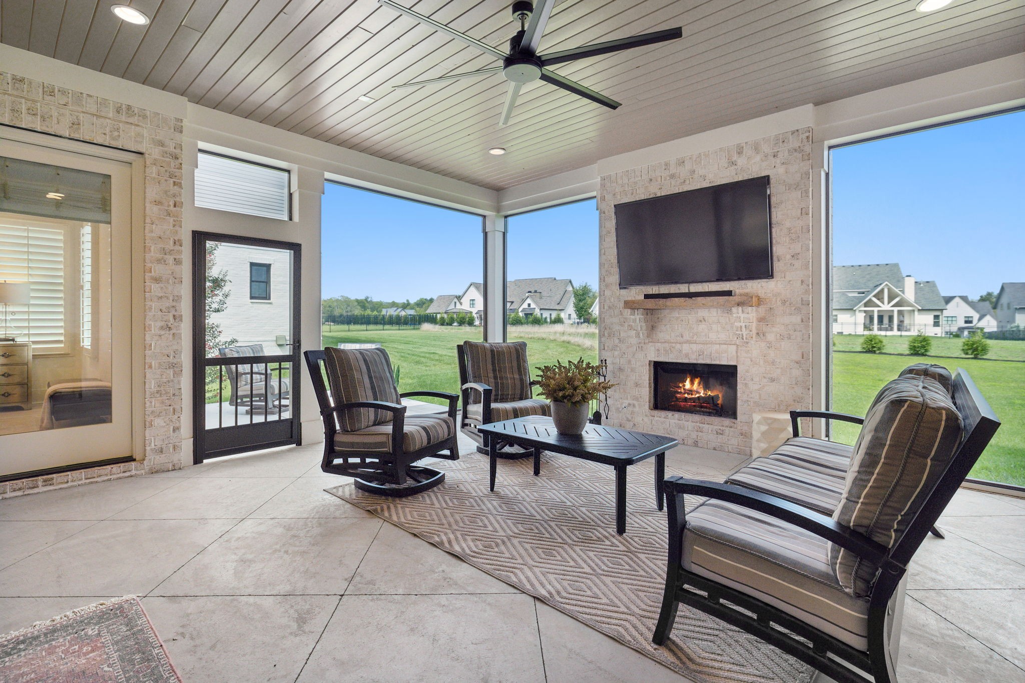 6324 Percheron Lane Arrington, TN 37014 - Photo 43 of 53 a living room with furniture a flat screen tv and a fireplace