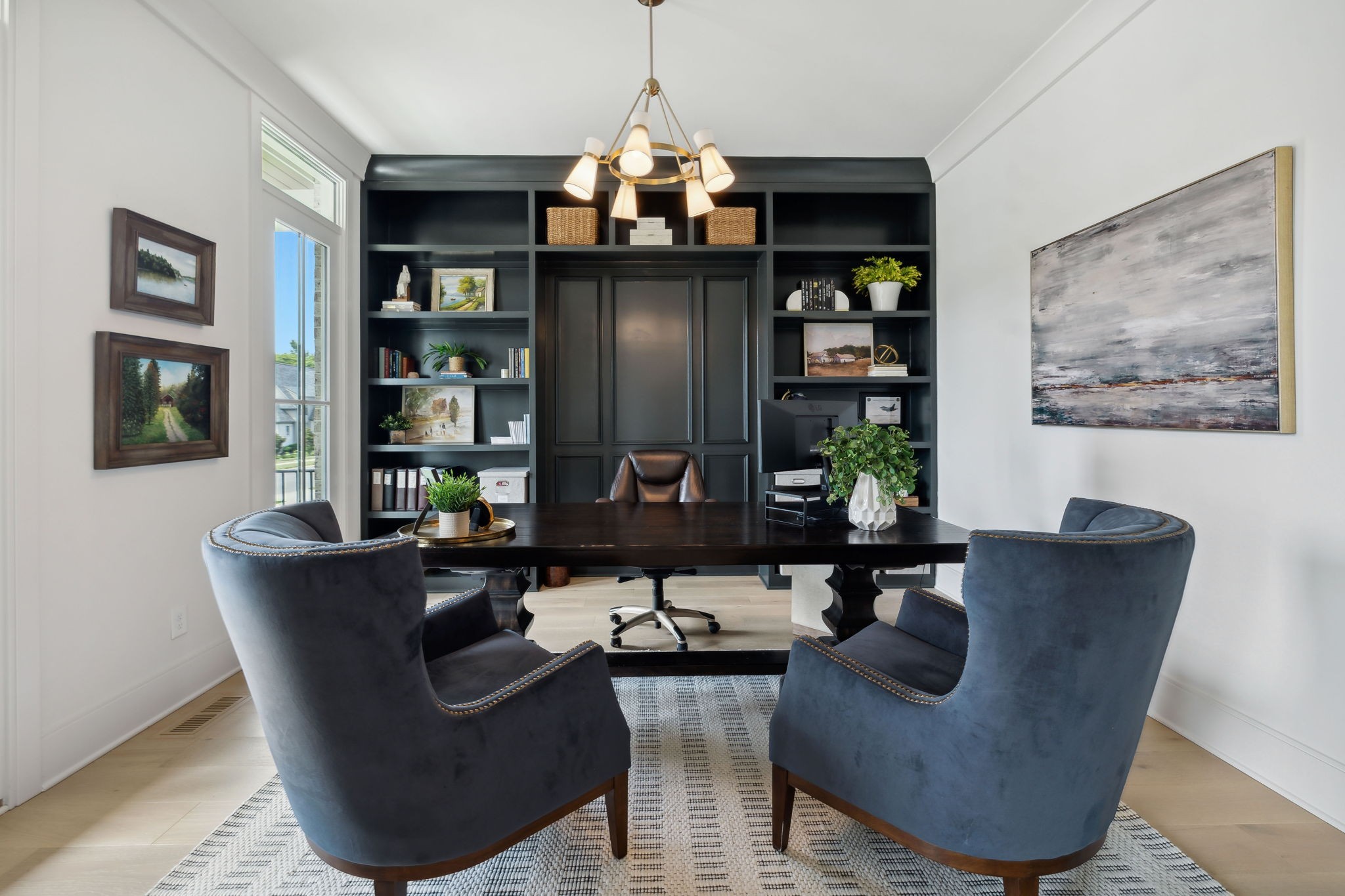 6324 Percheron Lane Arrington, TN 37014 - Photo 8 of 53 a living room with couches a fireplace and a dining table with wooden floor