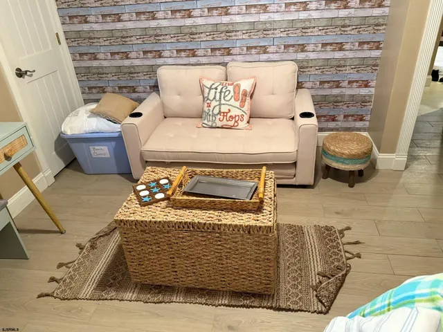 a view of a living room with furniture