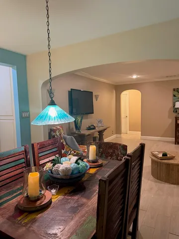 a kitchen with a table and chairs