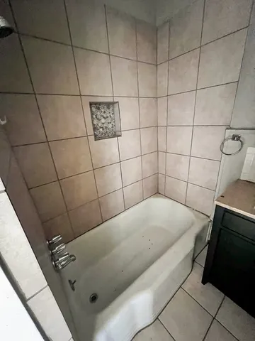 a bathroom with a bathtub