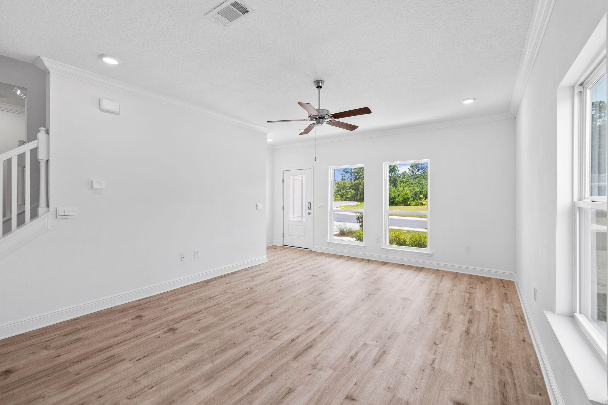 100 JRS Way Santa Rosa Beach, FL 32459 - Photo 13 of 74 wooden floor in an empty room with a window