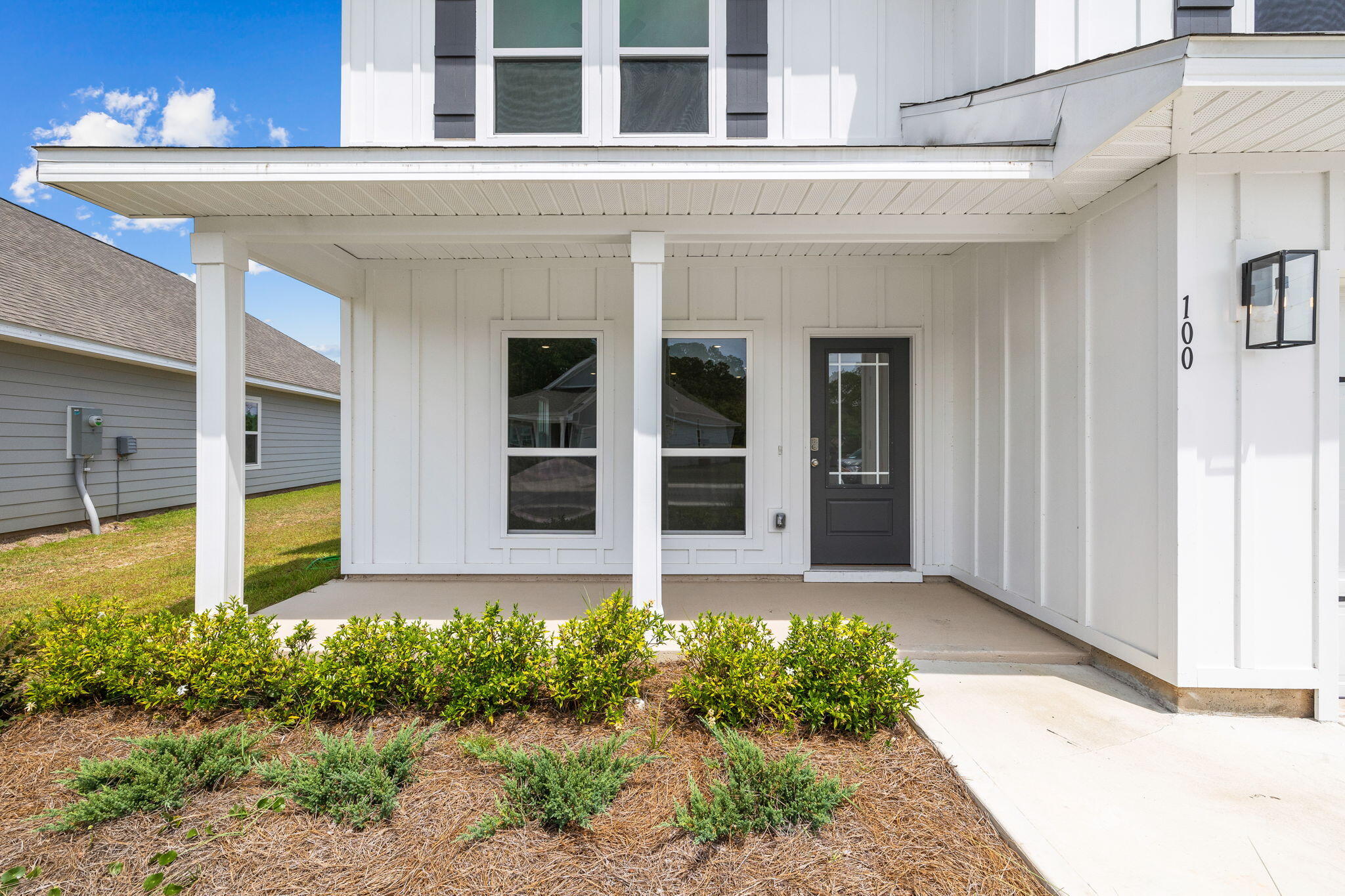 100 JRS Way Santa Rosa Beach, FL 32459 - Photo 2 of 74 a front view of a house with garden