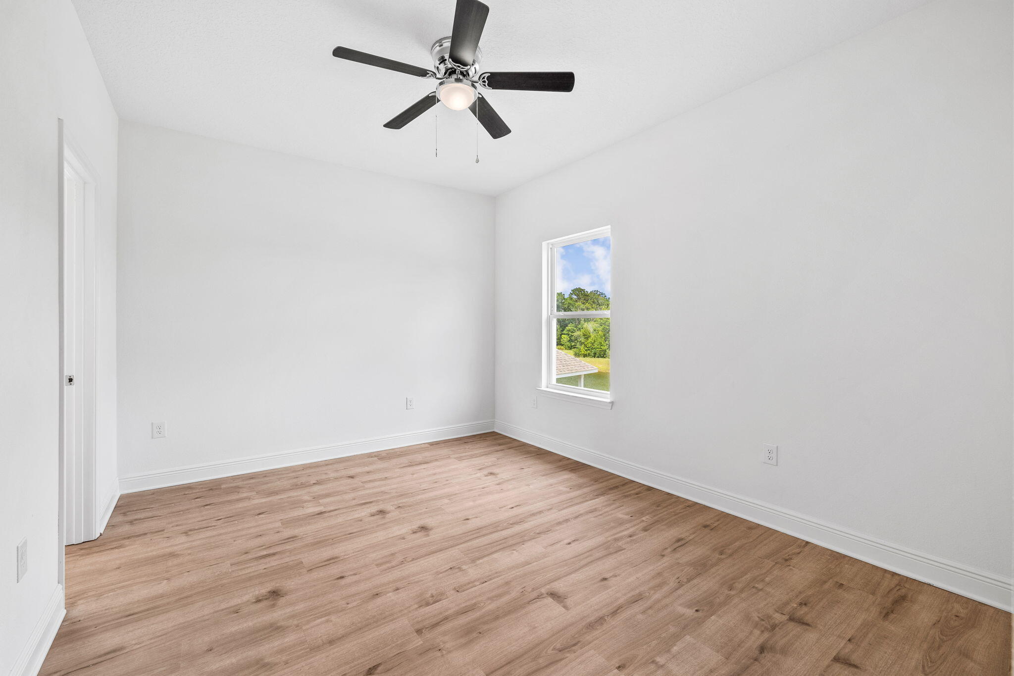 100 JRS Way Santa Rosa Beach, FL 32459 - Photo 27 of 74 an empty room with window and ceiling fan