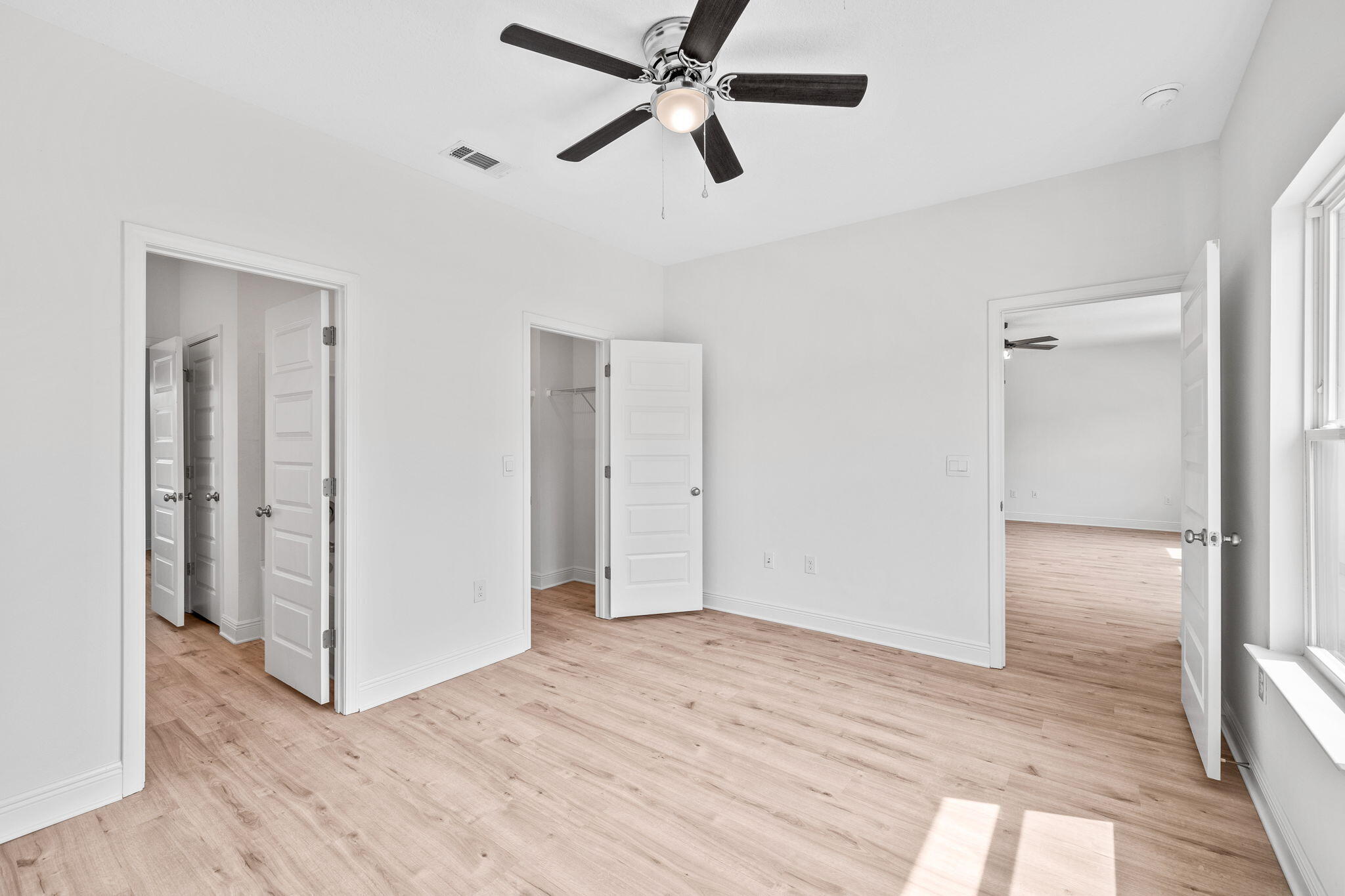 100 JRS Way Santa Rosa Beach, FL 32459 - Photo 29 of 74 a view of empty room with wooden floor