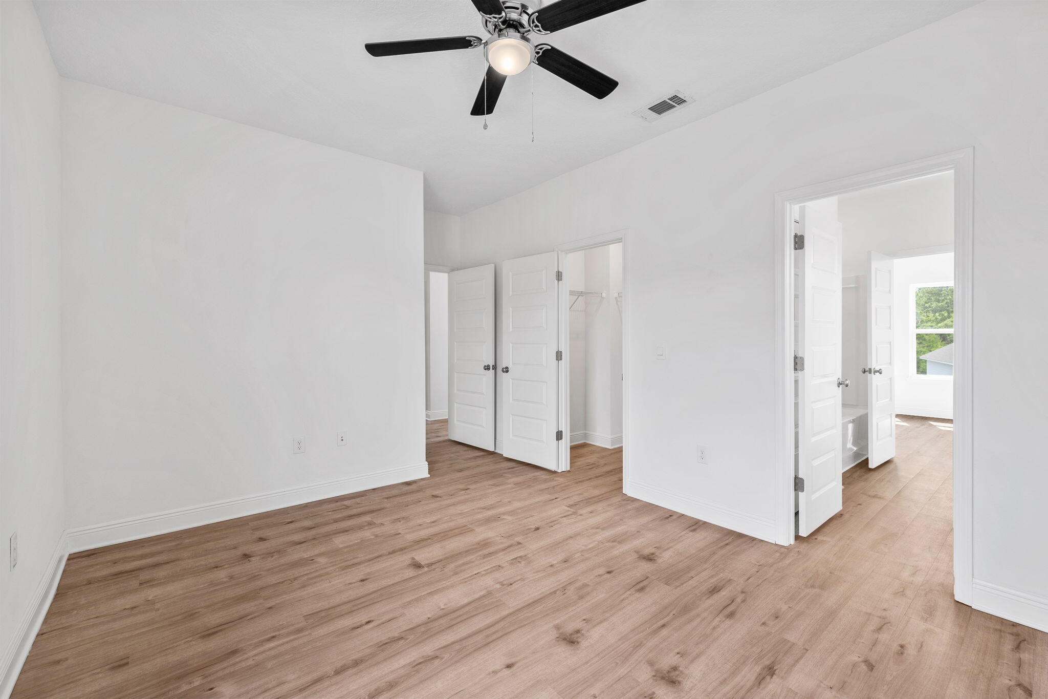 100 JRS Way Santa Rosa Beach, FL 32459 - Photo 32 of 74 a view of empty room with wooden floor
