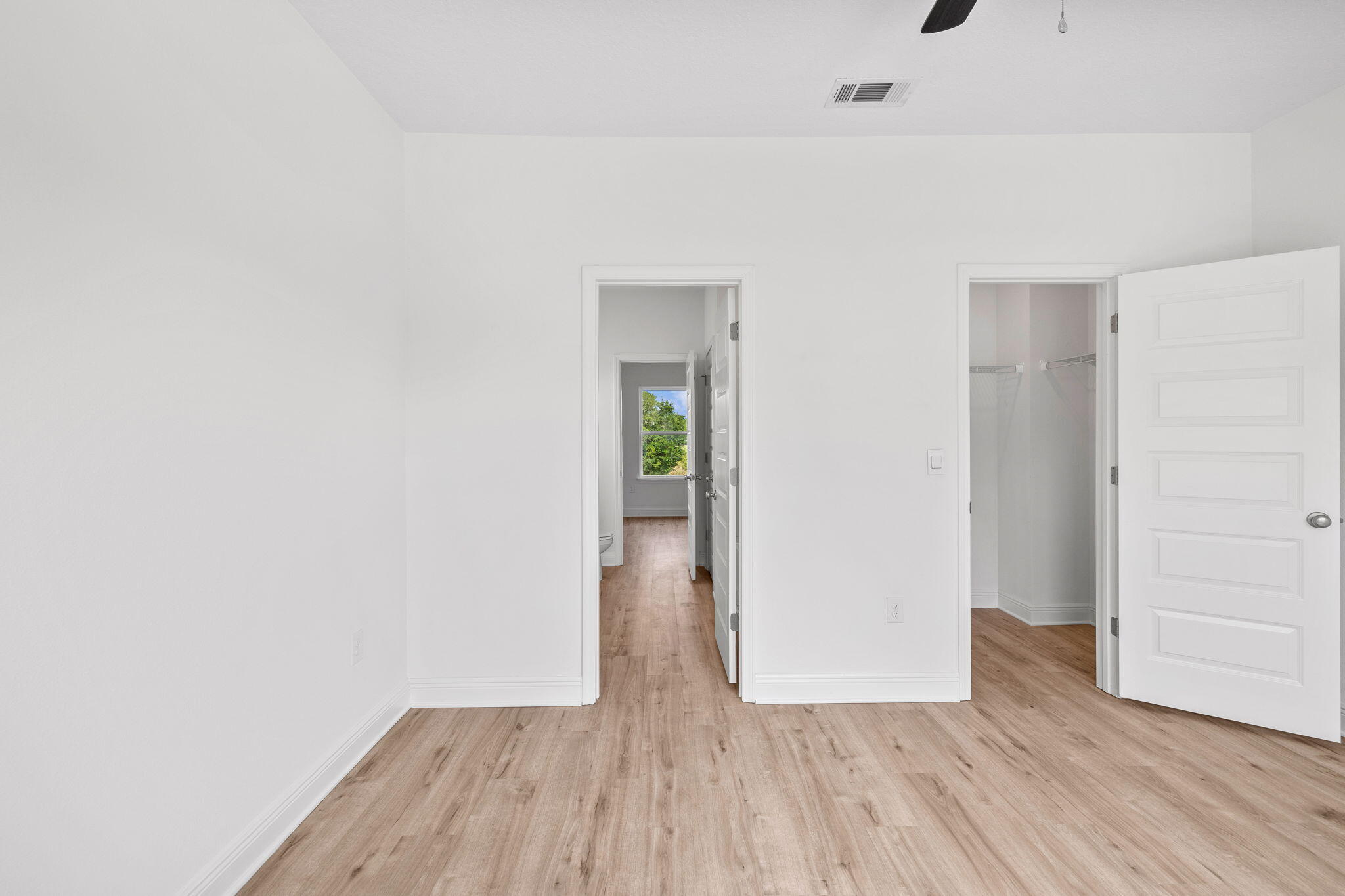 100 JRS Way Santa Rosa Beach, FL 32459 - Photo 35 of 74 an empty room with wooden floor and closet