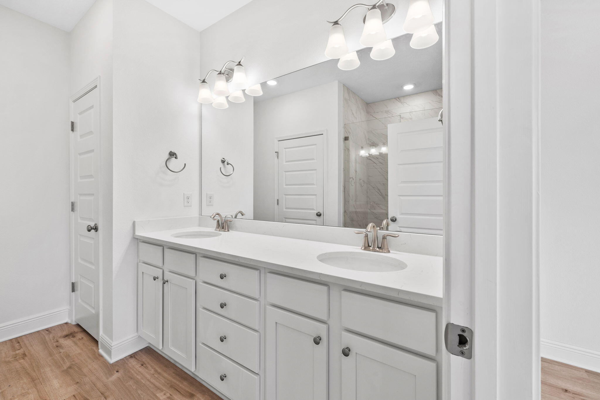 100 JRS Way Santa Rosa Beach, FL 32459 - Photo 37 of 74 a bathroom with double vanity sinks and a mirror