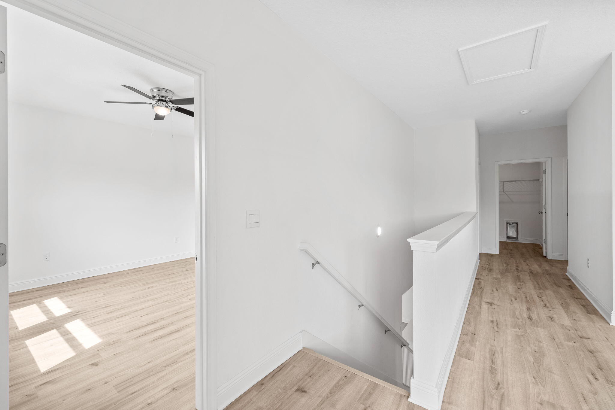 100 JRS Way Santa Rosa Beach, FL 32459 - Photo 40 of 74 a view of a room with wooden floor and white walls