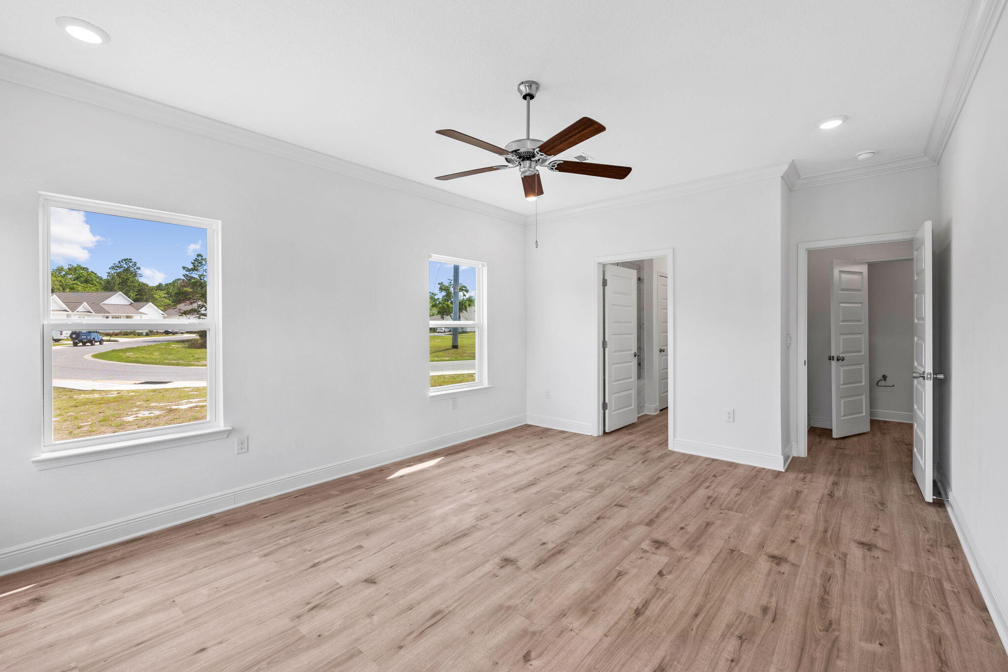 100 JRS Way Santa Rosa Beach, FL 32459 - Photo 44 of 74 wooden floor in an empty room with a window