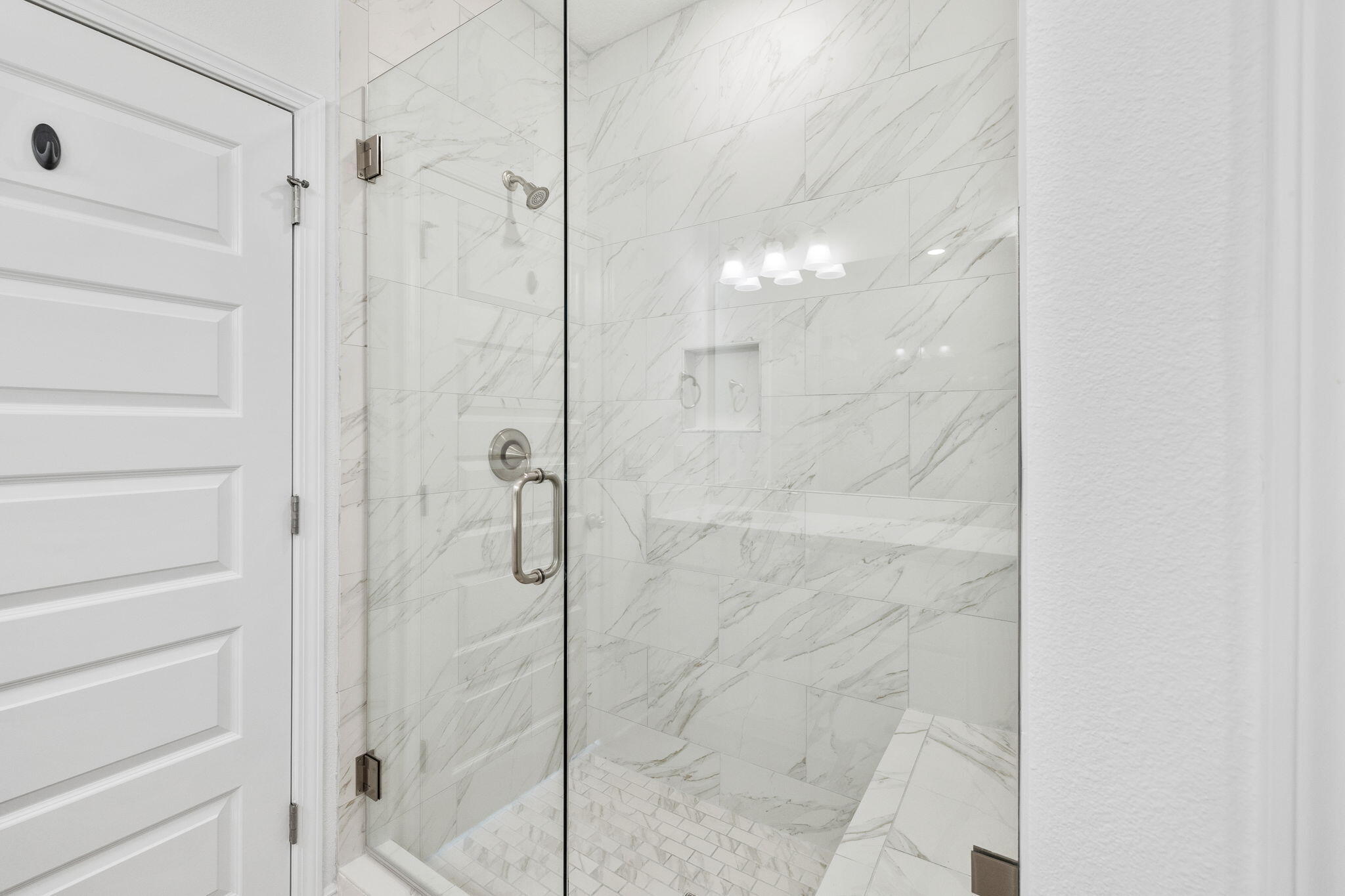 100 JRS Way Santa Rosa Beach, FL 32459 - Photo 45 of 74 a bathroom with a glass shower door