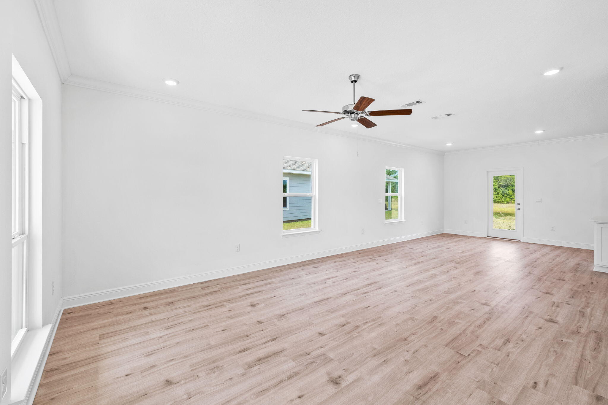 100 JRS Way Santa Rosa Beach, FL 32459 - Photo 48 of 74 wooden floor in an empty room with a window