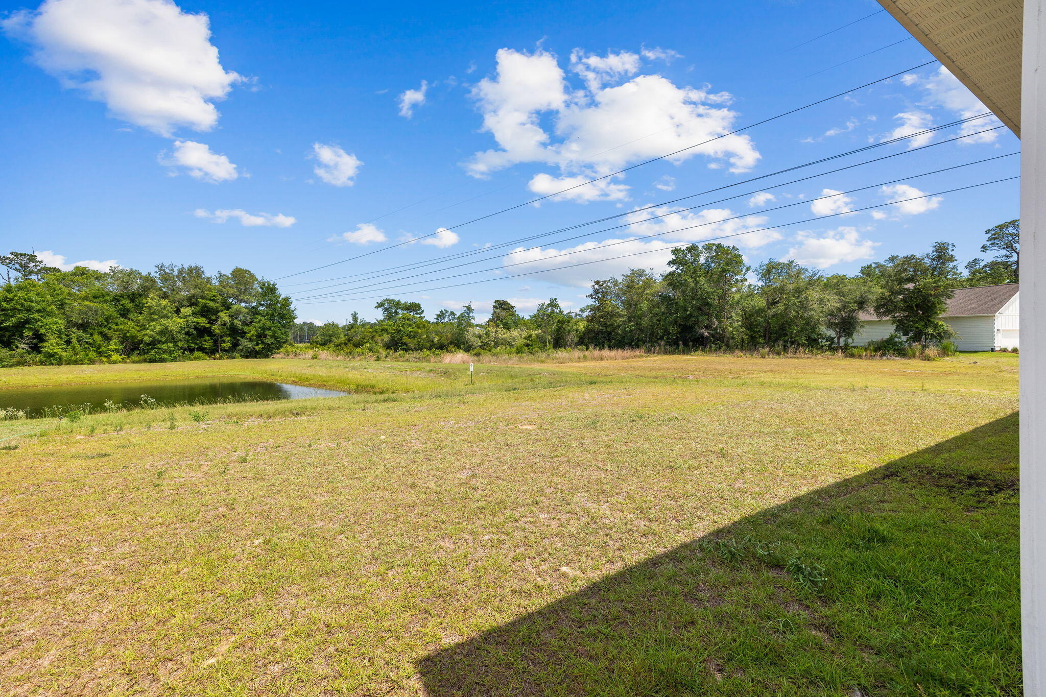 100 JRS Way Santa Rosa Beach, FL 32459 - Photo 52 of 74 a view of a lake and a yard