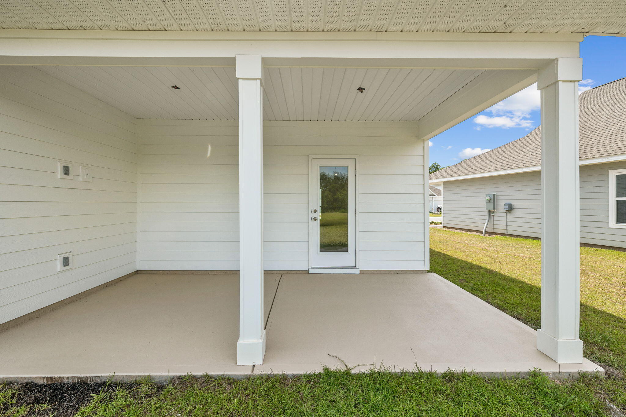 100 JRS Way Santa Rosa Beach, FL 32459 - Photo 54 of 74 a view of an empty room with a kitchen
