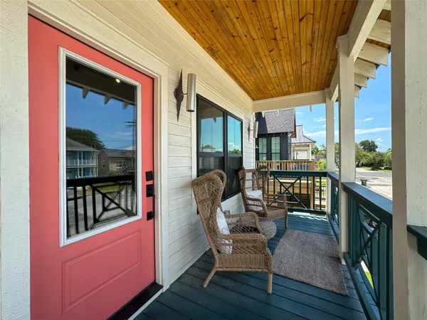 a view of balcony with furniture