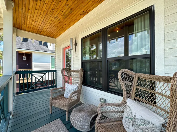 a view of a chairs on the deck