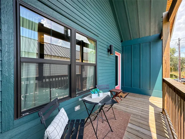 a patio with table and chairs