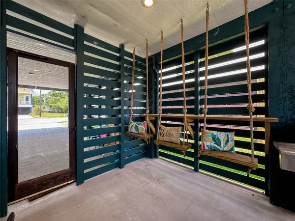 a kitchen with a table and chairs