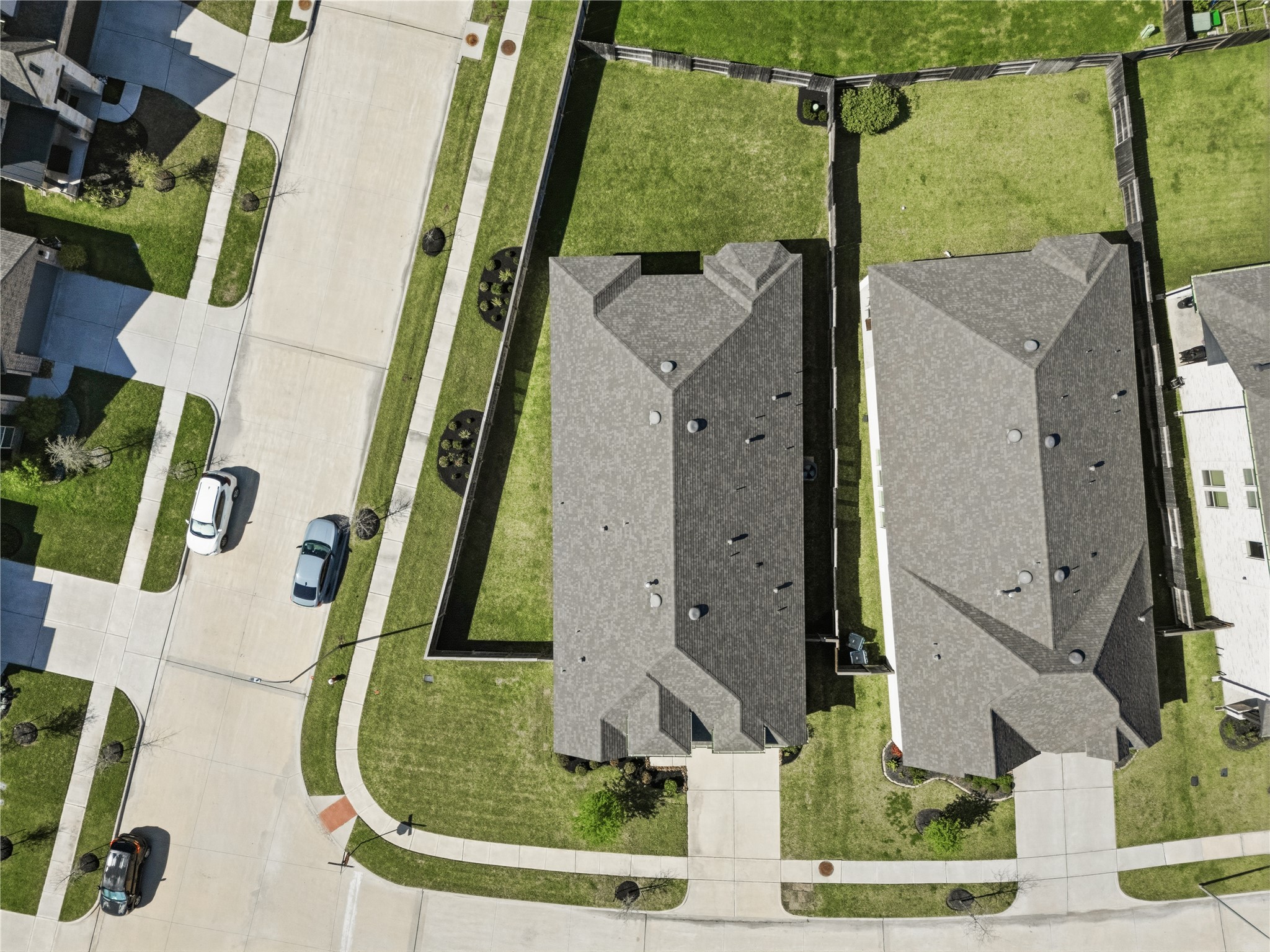 416 Bartlett Street Webster, TX 77598 - Photo 43 of 49 Aerial view showing corner lot footprint, landscaping, and roofline