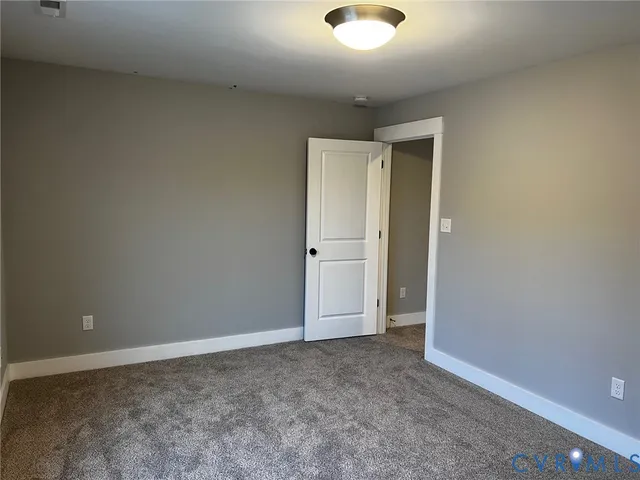 an empty room with an entryway