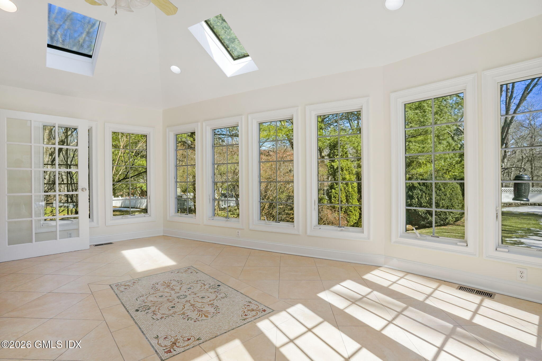 83 Westport Road Wilton, CT 06897 - Photo 15 of 45 a view of a room with large windows