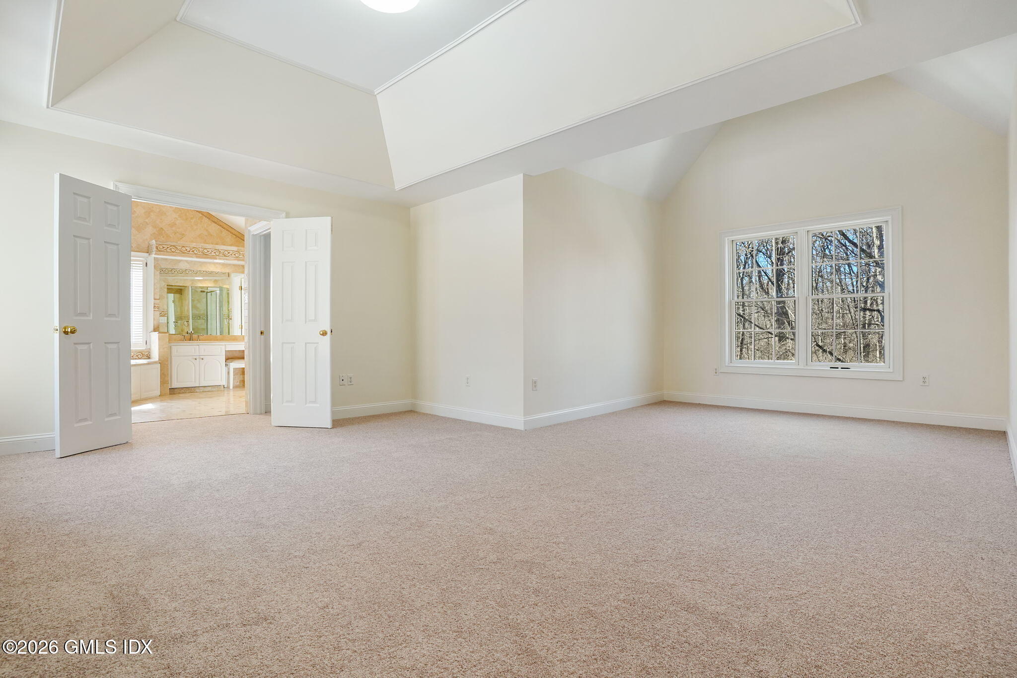 83 Westport Road Wilton, CT 06897 - Photo 19 of 45 an empty room with windows and closet