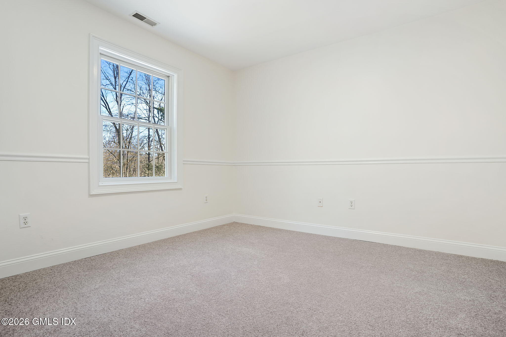 83 Westport Road Wilton, CT 06897 - Photo 23 of 45 an empty room with a window