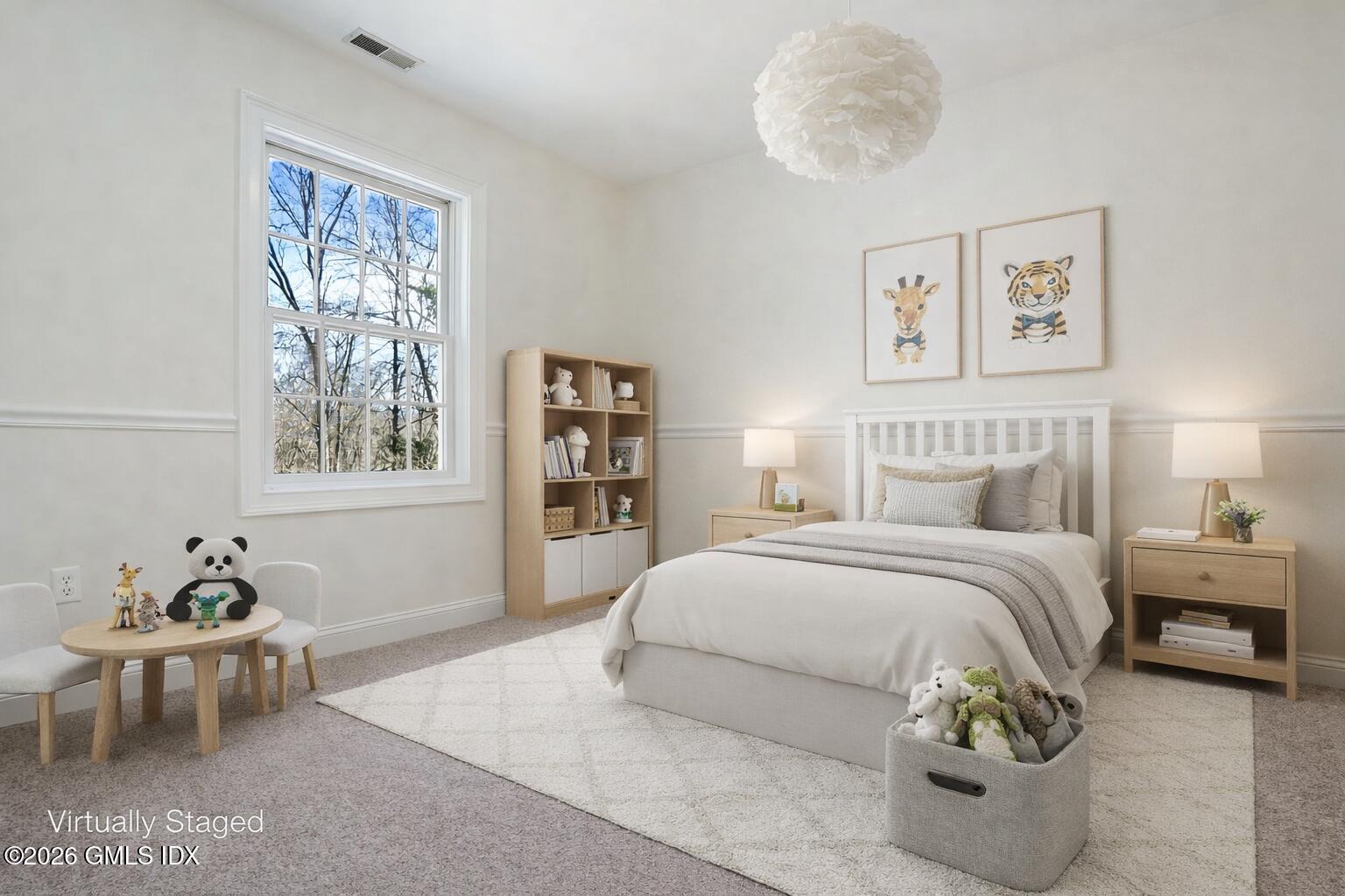 83 Westport Road Wilton, CT 06897 - Photo 24 of 45 a bedroom with a bed and a window