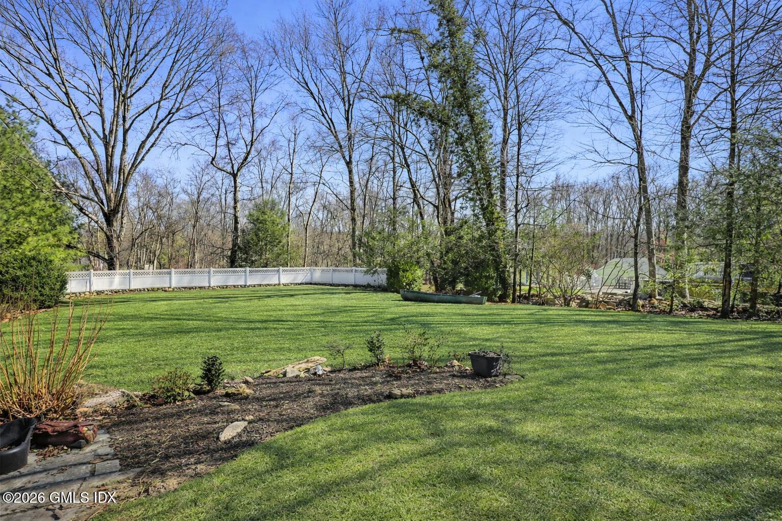 83 Westport Road Wilton, CT 06897 - Photo 37 of 45 a view of a park with large trees
