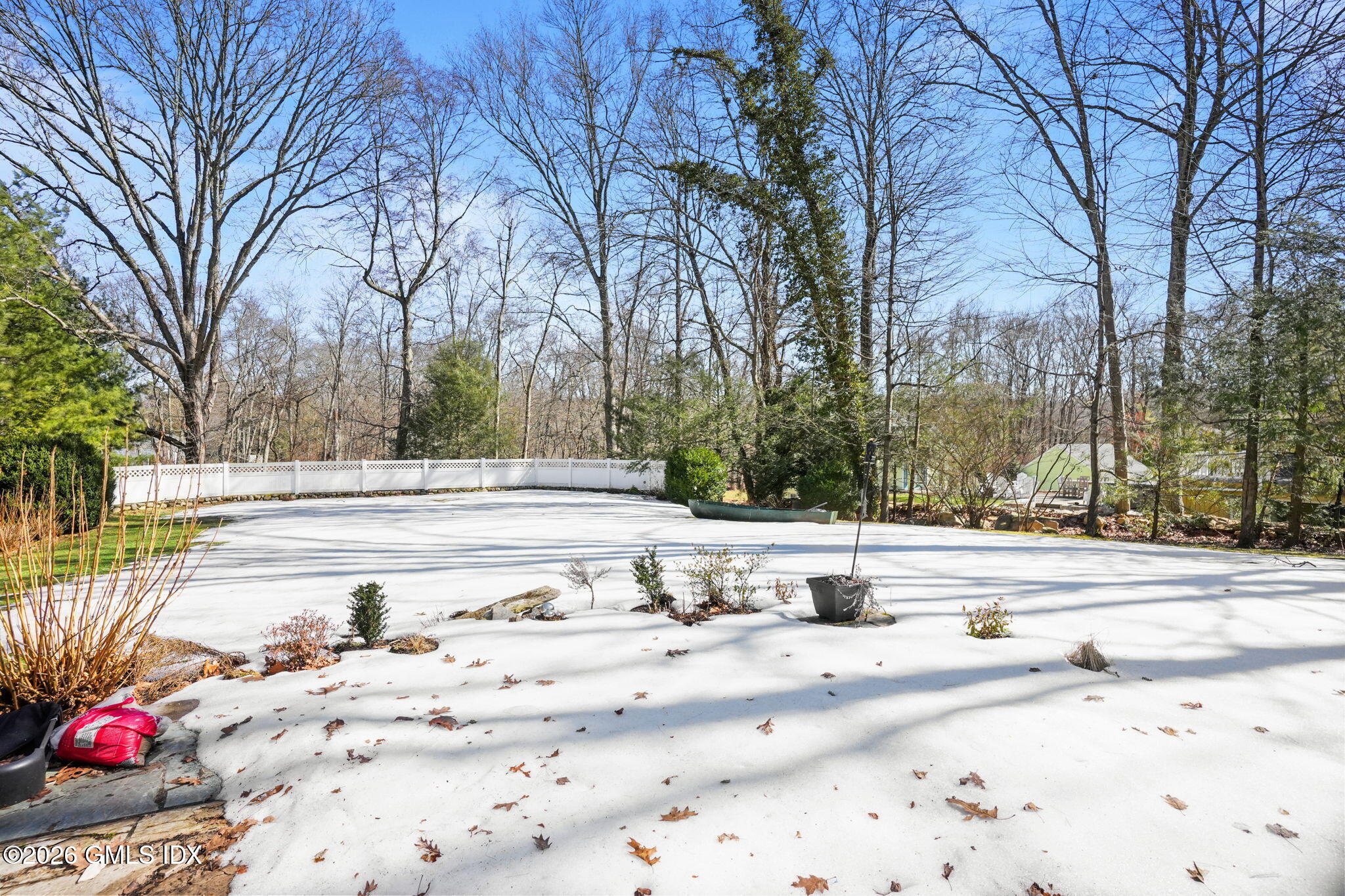 83 Westport Road Wilton, CT 06897 - Photo 38 of 45 a view of a parking space with snow on the road