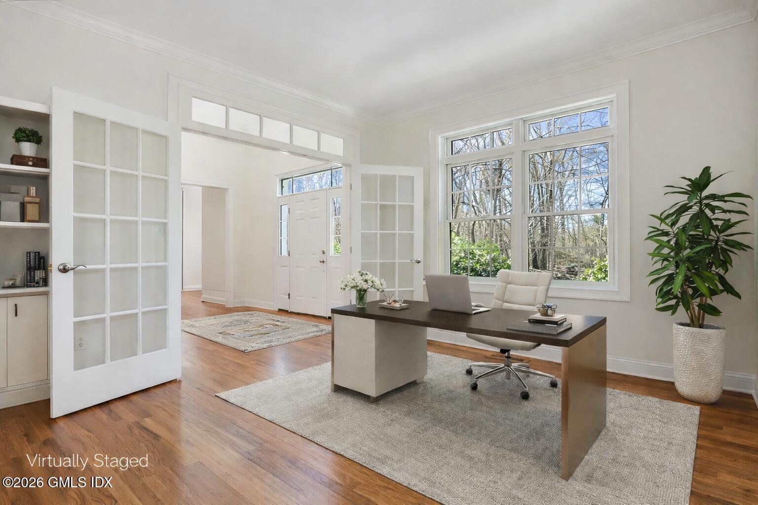 83 Westport Road Wilton, CT 06897 - Photo 6 of 45 a living room with furniture and window
