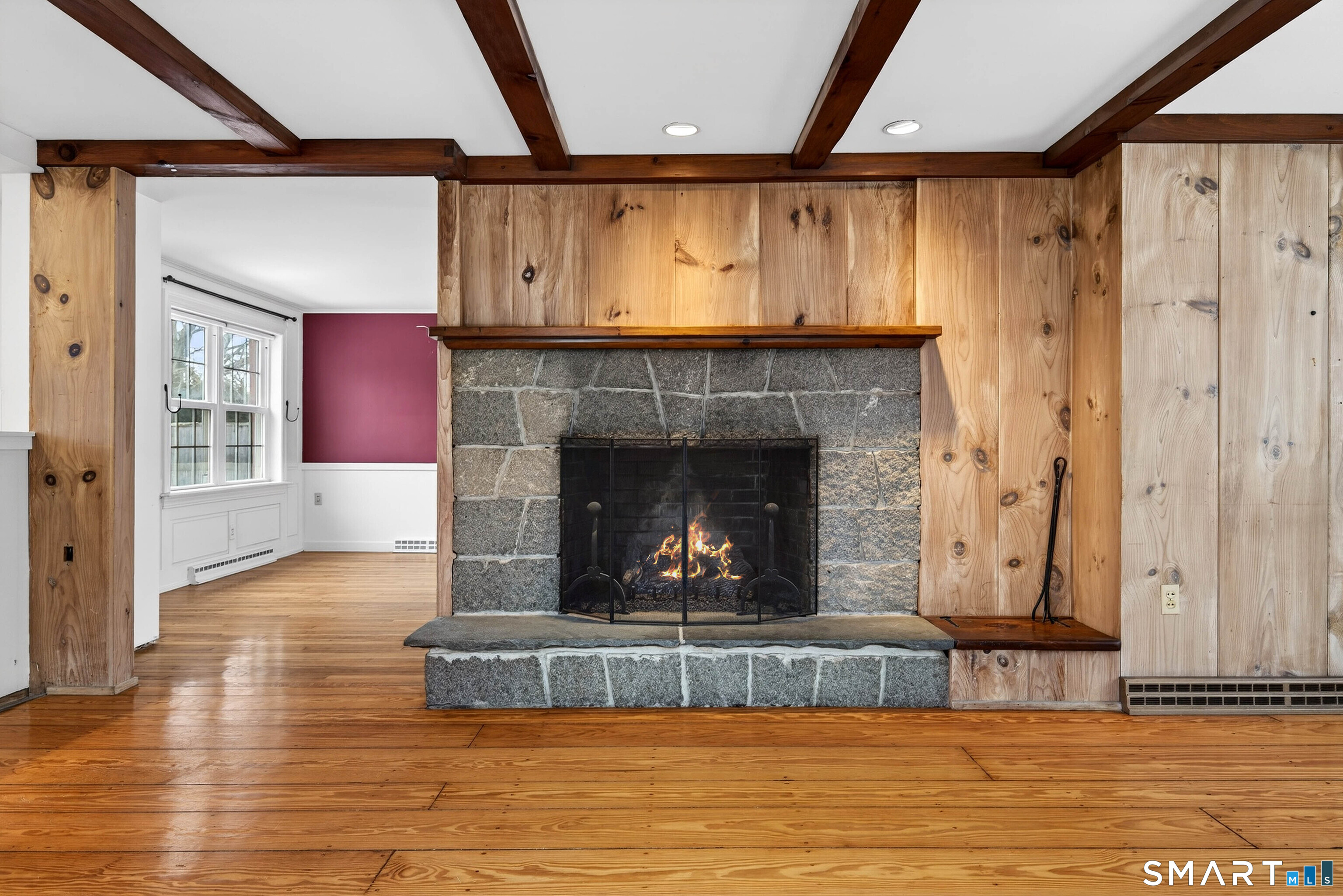25 Pond Road Old Saybrook, CT 06475 - Photo 12 of 40 a living room with furniture and a fireplace