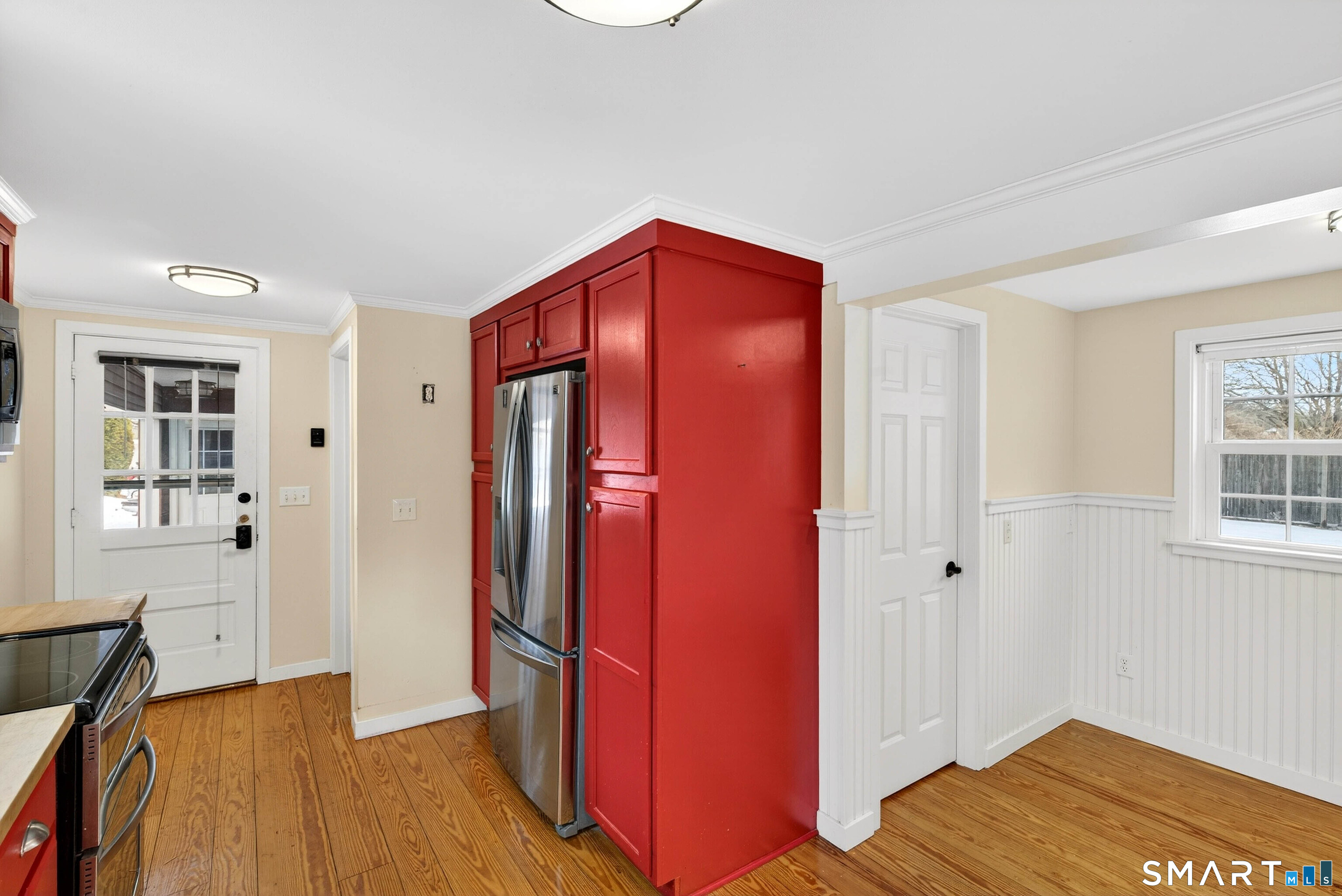 25 Pond Road Old Saybrook, CT 06475 - Photo 15 of 40 a view of a hallway with bathroom and wooden floor