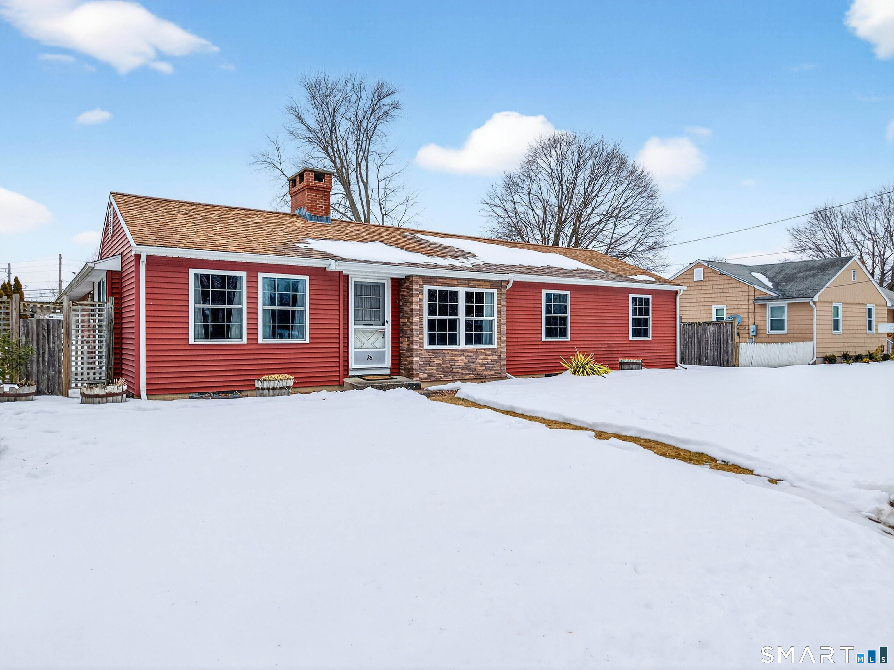 25 Pond Road Old Saybrook, CT 06475 - Photo 2 of 40 a front view of a house with a yard and garage