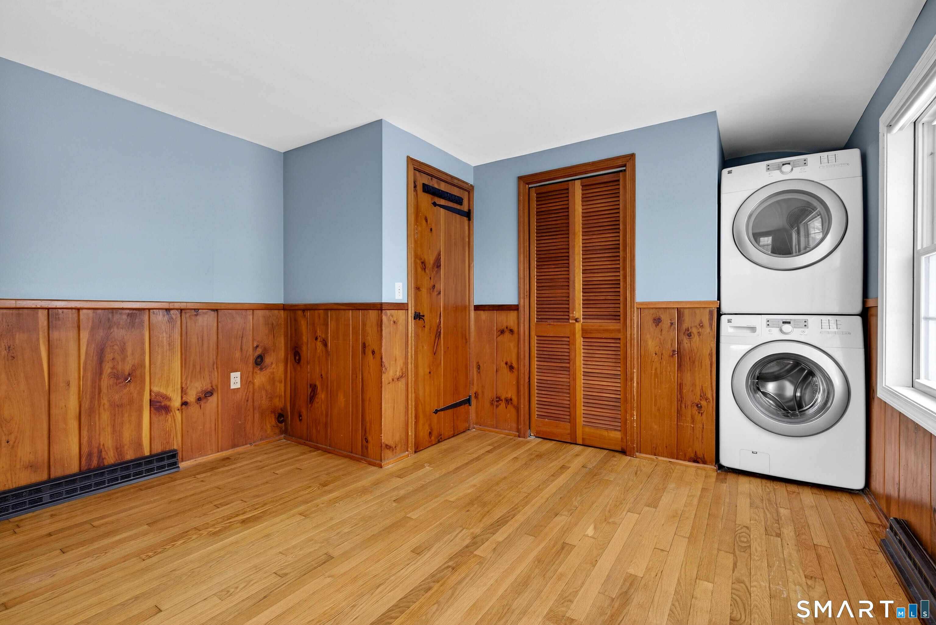25 Pond Road Old Saybrook, CT 06475 - Photo 27 of 40 a view of a storage & utility room with washer and dryer