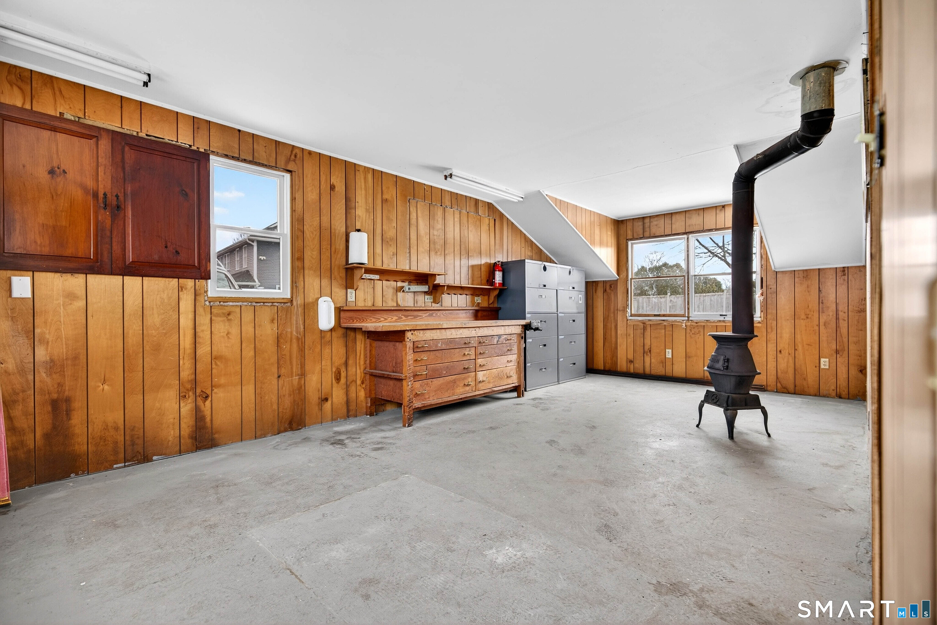 25 Pond Road Old Saybrook, CT 06475 - Photo 32 of 40 a view of a room with gym equipment and windows
