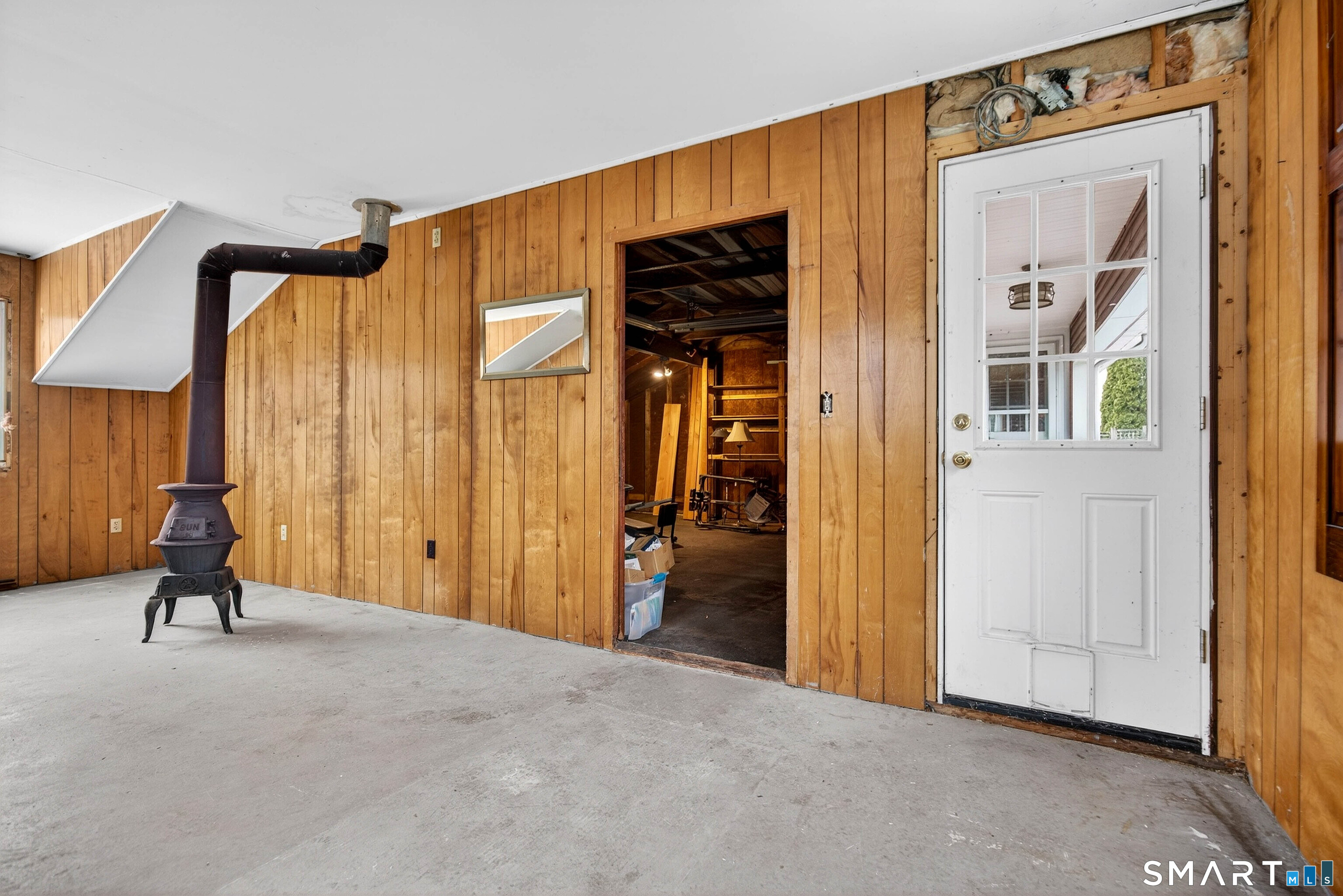25 Pond Road Old Saybrook, CT 06475 - Photo 33 of 40 a view of a hallway with wooden shelves