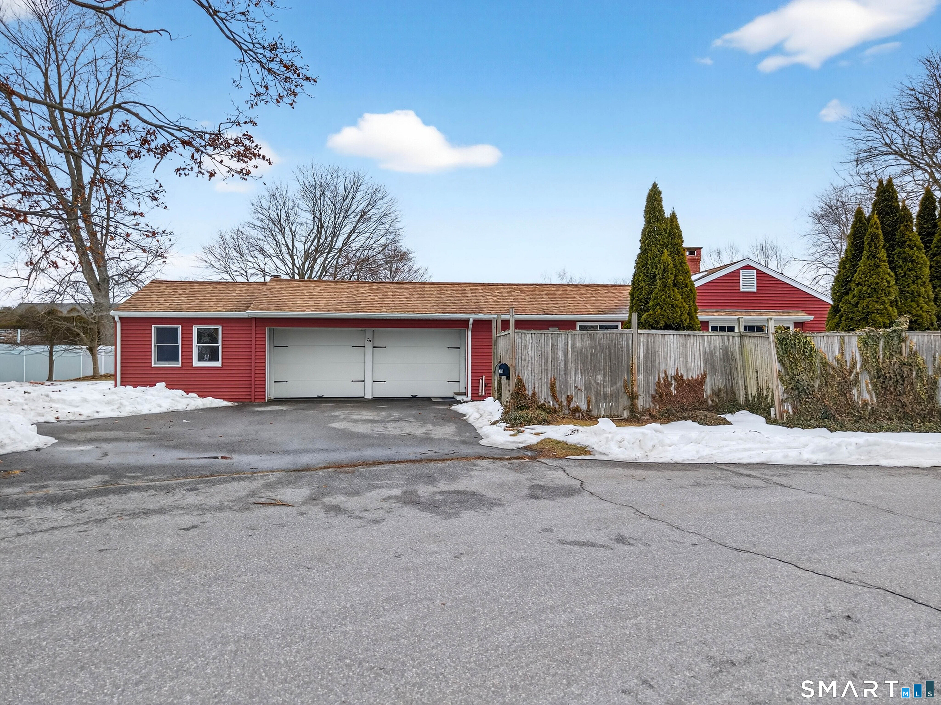 25 Pond Road Old Saybrook, CT 06475 - Photo 36 of 40 a view of a house with wooden fence and a tree