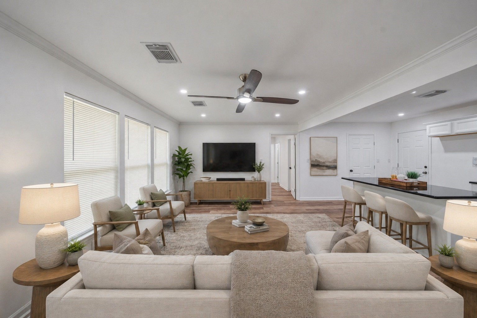 3051 Rothermel Road Houston, TX 77093 - Photo 2 of 24 This beautifully virtually staged living room offers a warm and inviting space, perfect for relaxation and entertaining.