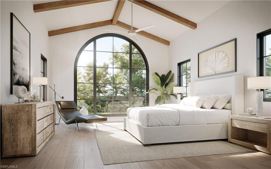 3880 Crayton Road Naples, FL 34103 - Photo 3 of 13 a living room with furniture and a large window