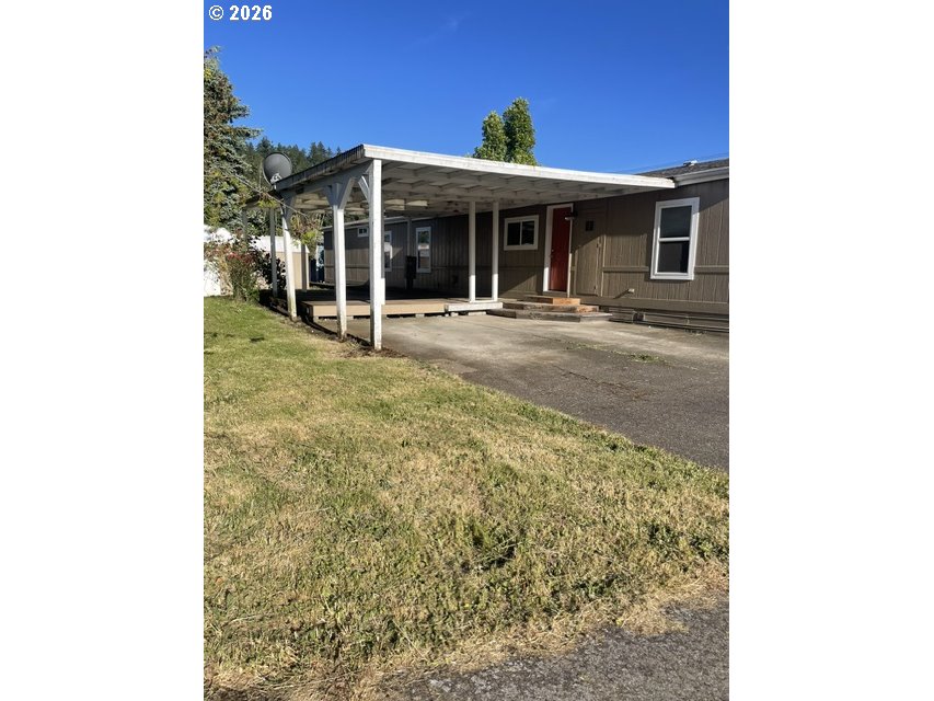 5660 Daisy Street, Unit 31 Springfield, OR 97478 - Photo 11 of 44 a view of a house with a porch