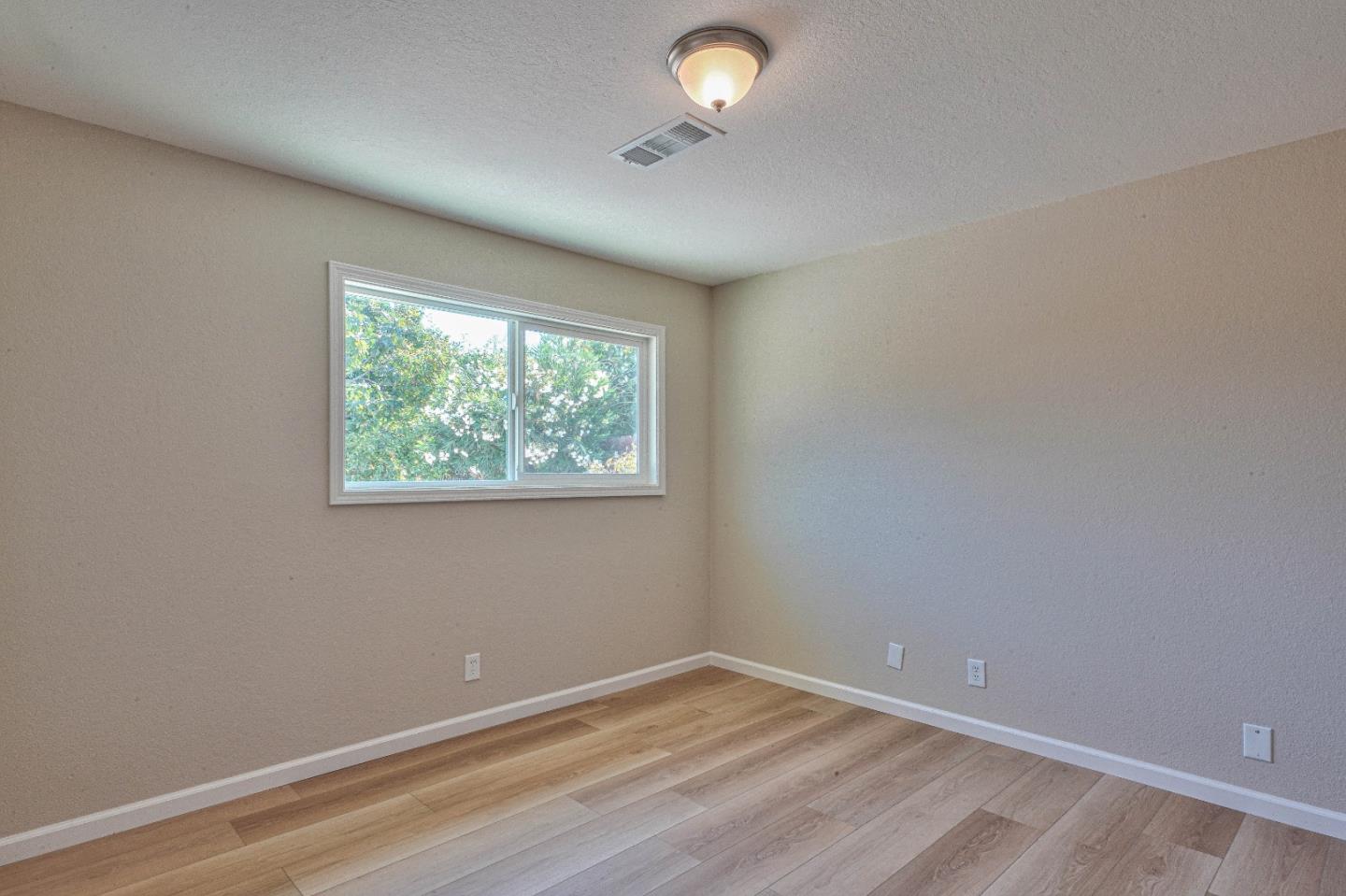 104 Inca Drive Soledad, CA 93960 - Photo 14 of 28 an empty room with a window