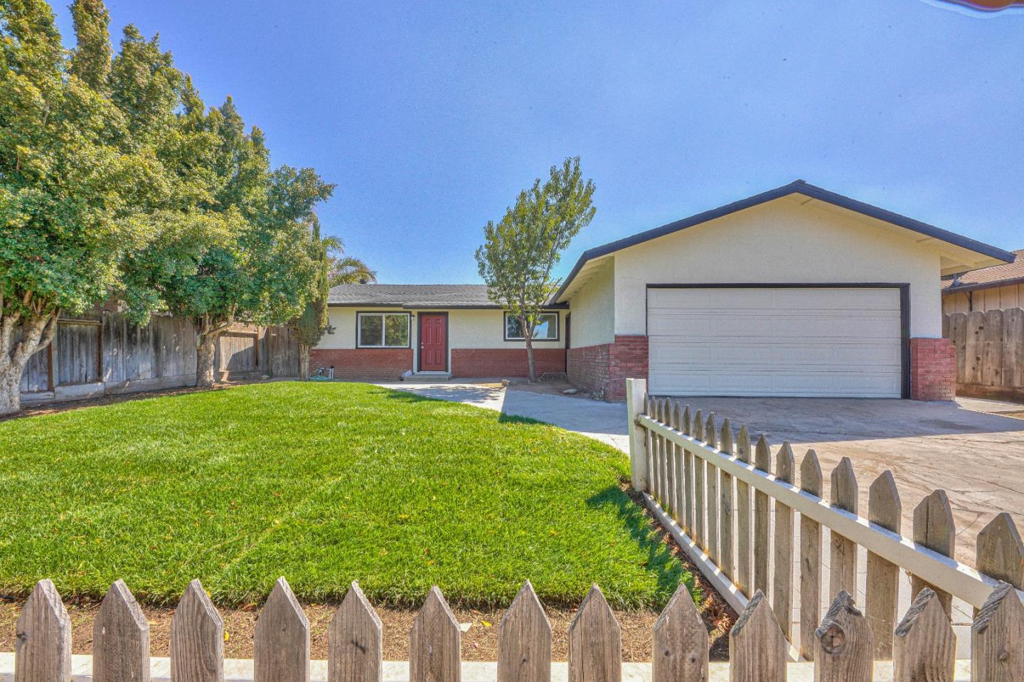 104 Inca Drive Soledad, CA 93960 - Photo 2 of 28 a front view of house with yard and green space