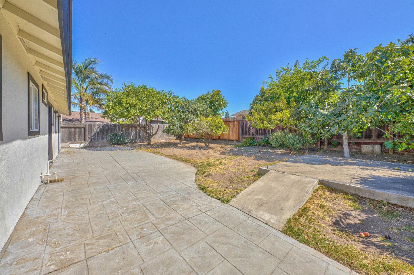 104 Inca Drive Soledad, CA 93960 - Photo 23 of 28 a view of backyard with outdoor seating and plants