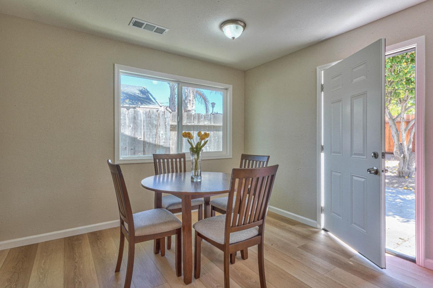 104 Inca Drive Soledad, CA 93960 - Photo 7 of 28 a view of a dining room with furniture and wooden floor