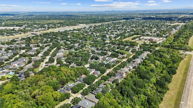 a bedroom with a bed and a table