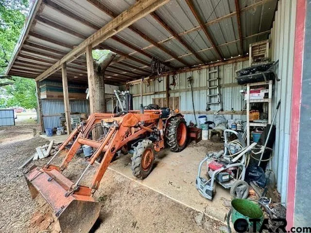 a view of a storage room with furniture