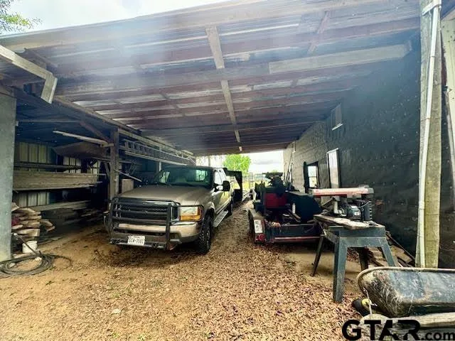 a view of a garage with chairs